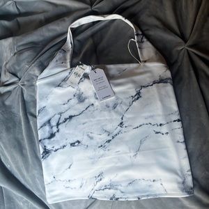 Express body contour collection high compression black and white marble tank top